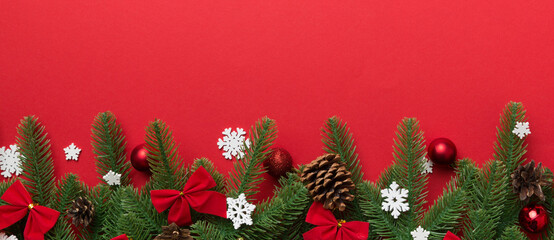 Christmas background with fir branches and Christmas decor. Top view, copy space for text