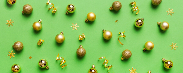 Christmas composition. a pattern of christmas balls on colored background. Flat lay, top view New year decor