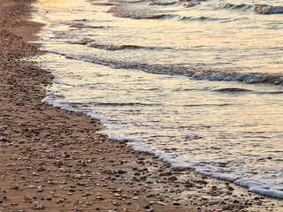 Sanlúcar de Barrameda beach. Opposite is the Doñana National Park. Sunset and fishing boats.