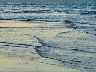 Sanlúcar de Barrameda beach. Opposite is the Doñana National Park. Sunset and fishing boats.