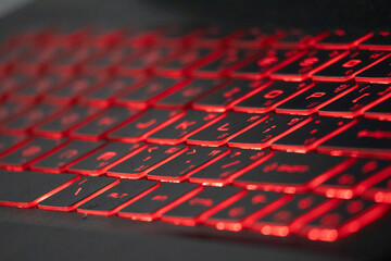 Red Backlit Keyboard Close Up.