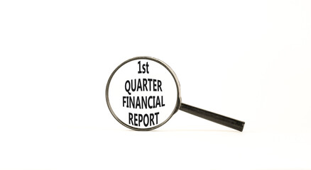 1st quarter financial report symbol. Concept words 1st quarter financial report on beautiful magnifying glass. Beautiful white background. Business 1st quarter financial report concept. Copy space.