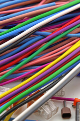 Copper electrical installation wires in colored insulation. Close-up. Soft focus.