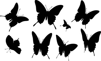 Naklejka premium A collection of black butterfly silhouettes in various poses, perfect for nature-themed designs and artistic projects.
