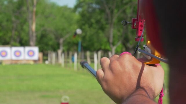 Releasing arrows with an Olympic bow in slow motion