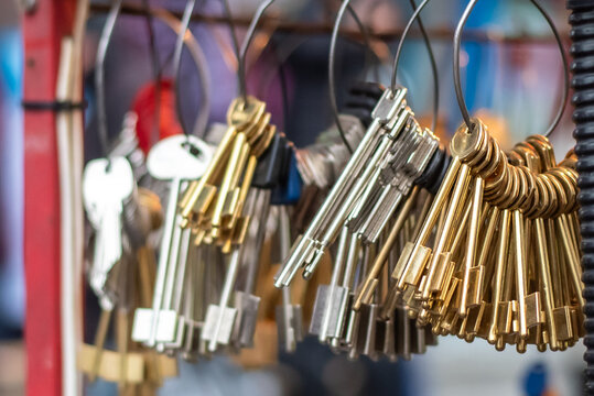 A variety of keychains for copying keys in a locksmith workshop. Key making. Bunch of keys