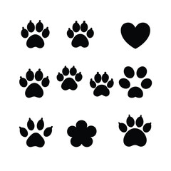 Fototapeta premium a collection of 16 black paw prints arranged in a grid-like pattern