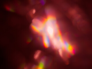 Fototapeta premium Pink blurred reflections in the dark for an abstract background. 