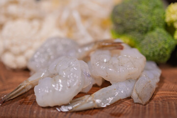 Cooking a dish, vegetables with shrimp and sauces