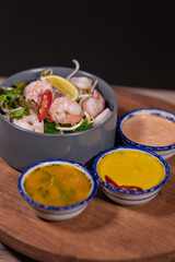 Cooking a dish, vegetables with shrimp and sauces