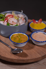 Cooking a dish, vegetables with shrimp and sauces