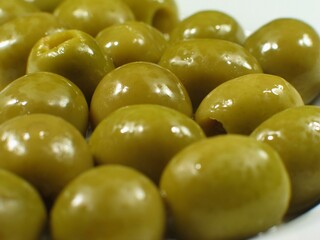 Green olives close view background