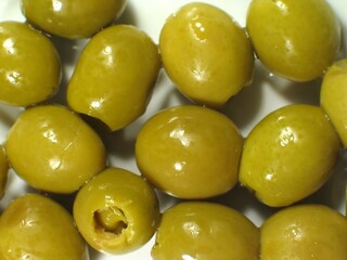 Green olives close view background