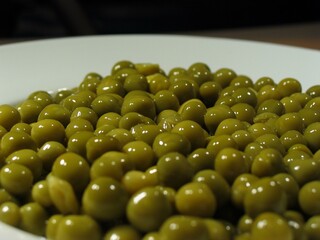 Green peas dish close view background