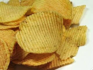 Potato chips or crisps close view background
