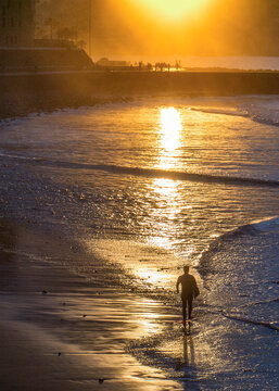 surfing on the beach of la cicer in Las Plamas de Gran Canaria