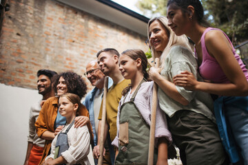 People working in community garden at socially inclusive neighbourhood project