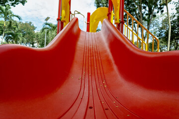 A colorful children slide installed in a public park for all to use