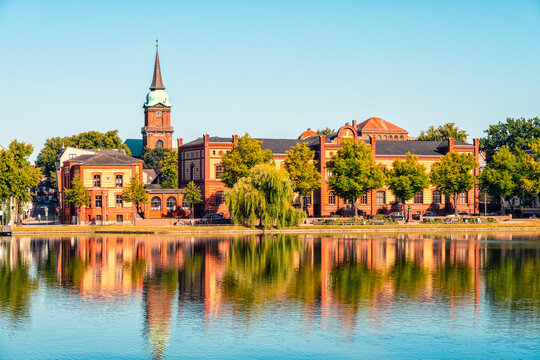 Panoramic view of Pfaffenteich and Schelf Church with reflection in Schwerin, Germany