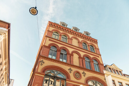 Historic colorful buildings on Kr�peliner Str. in the old town of Rostock, Germany.