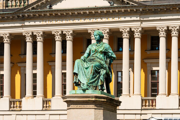 Statue of Hygiea in front of Raczy?ski Library at Wolno?ci Square in Poznan Poland