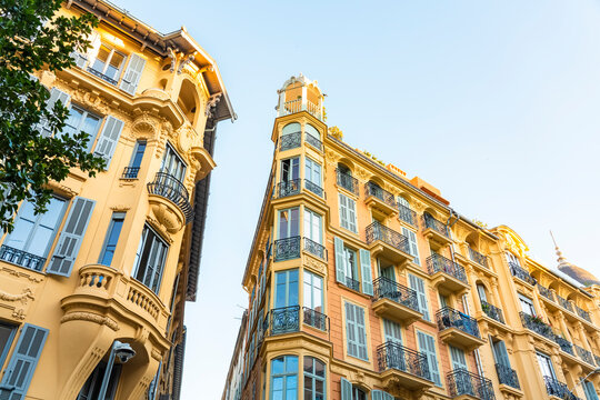 Historic architecture details of buildings in Nice, France on a summer day.