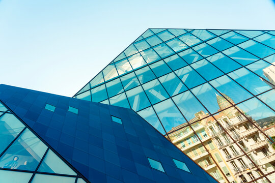 Modern glass building with cubic form in Nice, France.