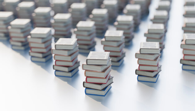 Stacks of books arranged in symmetrical rows on a white background.