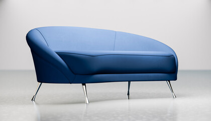 Modern blue upholstered sofa in a minimalistic indoor setting.