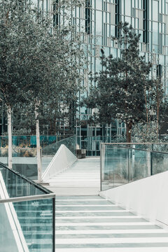 Chic modern pathways merge with natural elements, creating an engaging architectural experience that promotes harmony between the built environment and nature for urban dwellers in London UK