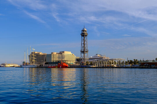 Waterfront view of Telef�ric del Port and surrounding buildings in Barcelona at the harbor