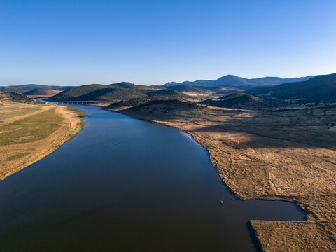Aerial view of the Embalse de La Serena in Capilla, Badajoz, Southern Spain, highlighting drought and environmental destruction.