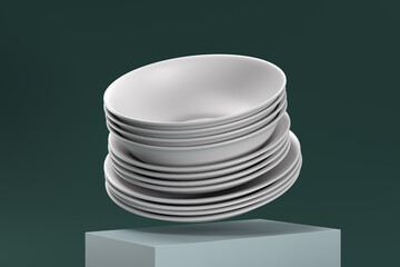 A stack of white plates is on top of a green cube