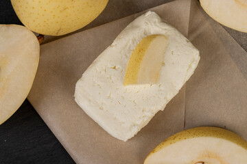 light breakfast of dairy products with pear fruit