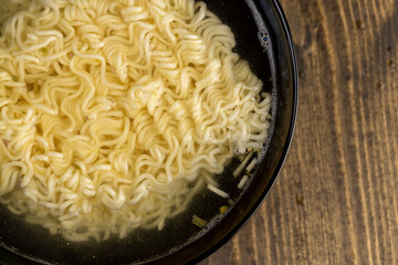 details of flour noodles with eggs during cooking