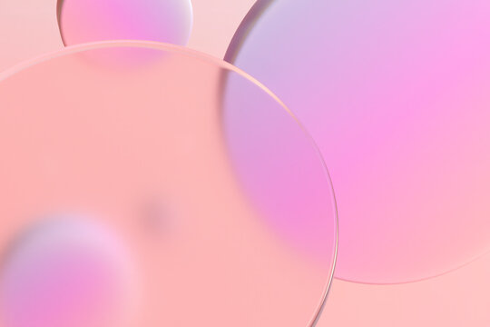 Geometric 3D primitives in pink and purple tones with translucent glass details