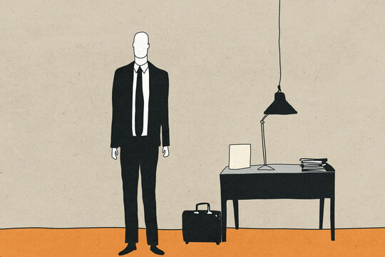 Faceless businessman standing in an office with a desk and briefcase.