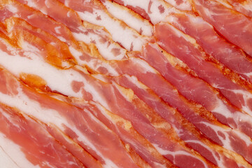 fresh thinly sliced pork bacon with meat and bacon