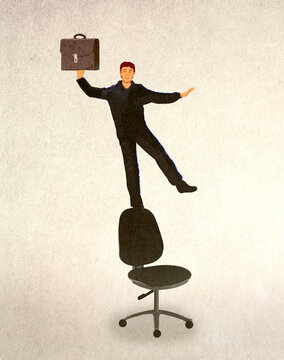 Businessman balancing on an office chair holding a briefcase.