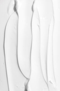 White cream texture with smooth abstract patterns