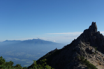 Mt. Houousanzan, Mt. Phoenix, Jizo-dake, obelisk, behind Yatsugatake