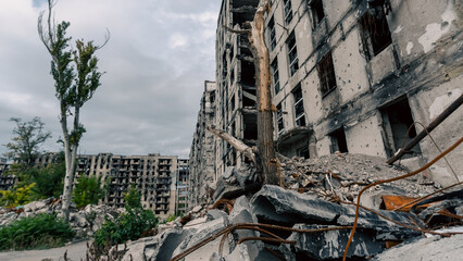 destroyed and burned houses in the city in Ukraine