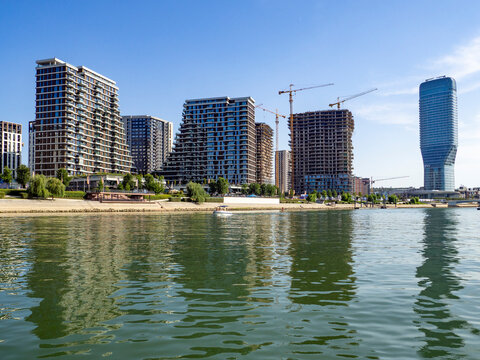 Waterfront view of Belgrade residential complexes and high-rises along the Sava River.