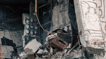 destroyed and burned houses in the city in Ukraine