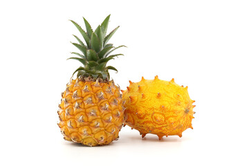 Bright Pineapple and Kiwano on White Background