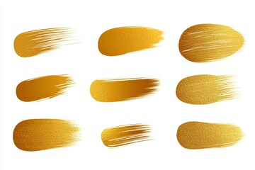 A set of gold brush strokes on a white background