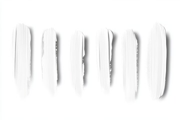 A row of white brush strokes, each varying in length and thickness