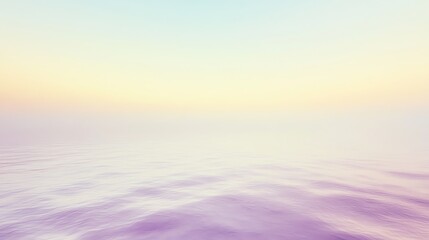 Fototapeta premium Soft, blurred image of an ocean and sky in pastel tones.