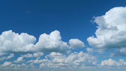 Cloud cloudscape. Puffy fluffy white clouds. Nature weather blue sky. Time lapse.