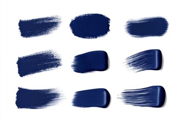 A set of blue paintbrush strokes, each with a different texture and style